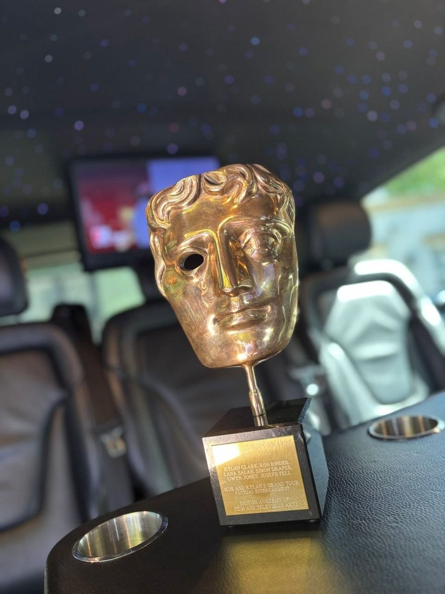 BAFTA Television Award trophy resting in the Mercedes-Benz V-Class cabin — Travel in Style Essex chauffeured the BAFTA winners