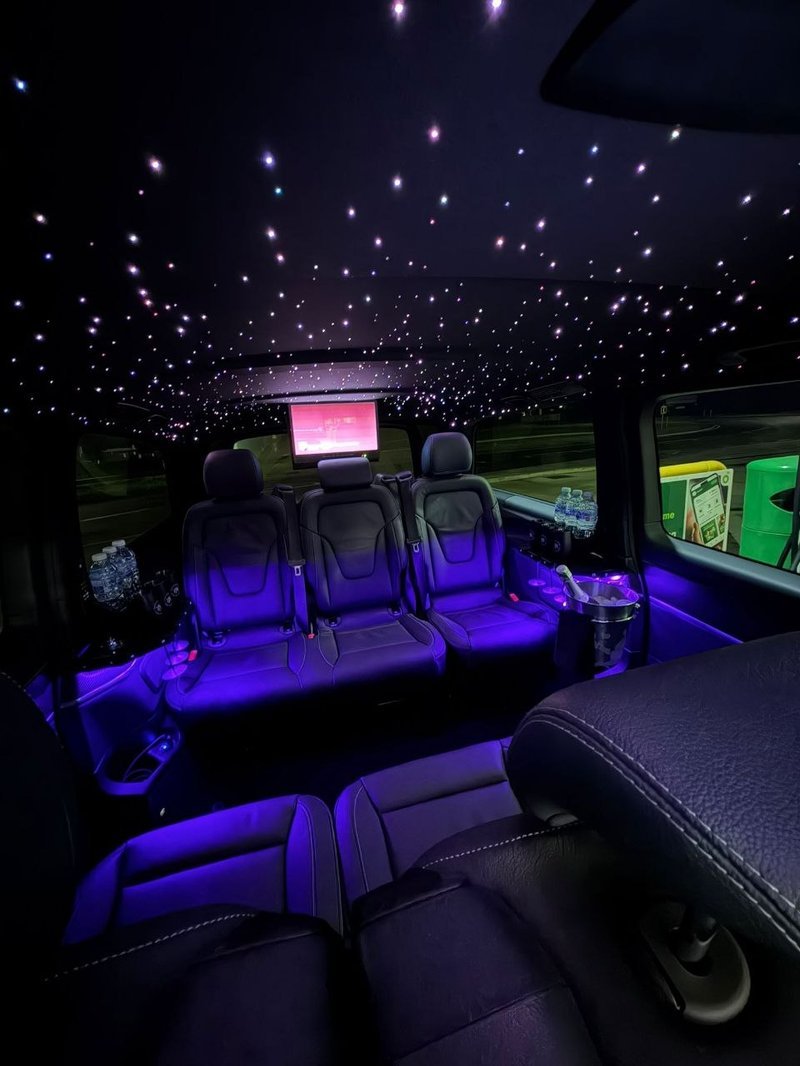 V-Class private chauffeur cabin with rear entertainment screen and complimentary refreshments